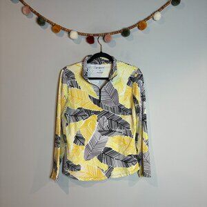 IKBUL yellow black and white patterned half zip vented golf top